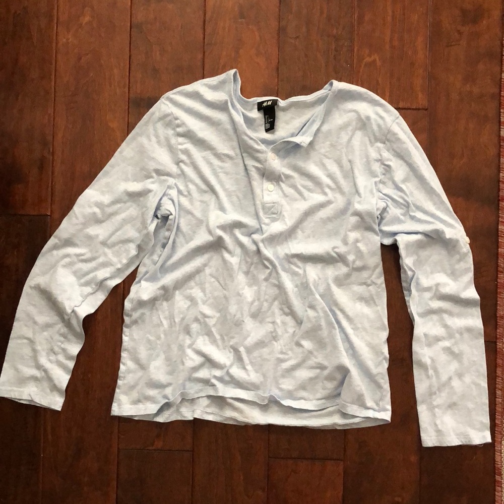 H&M baby blue deep Henley with button up sleeves.